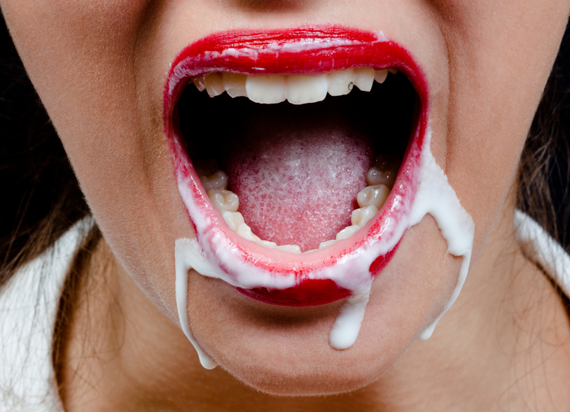 woman with cream around her mouth